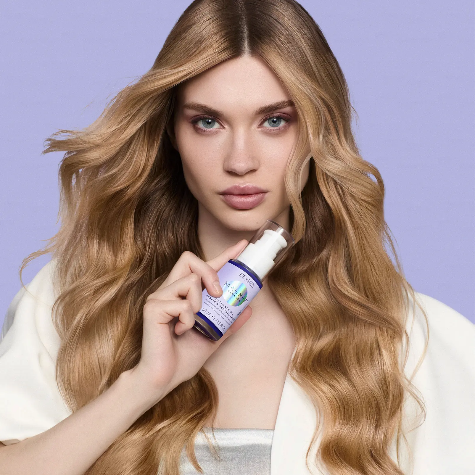 Woman holding magnet blondes hair product